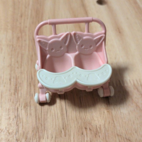 Poussette double rose