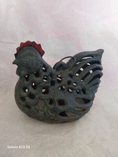 Poule en fonte bougeoir