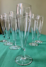 Lot 1 : 6 flûtes à Champage en verre signées Veuve Clicquot - H : 19,5 cm