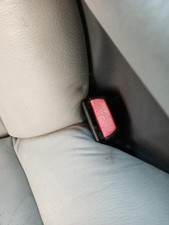 Attache ceinture arriere