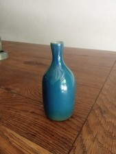 vase bouteille a col décentré signé ruelland , parfait état .