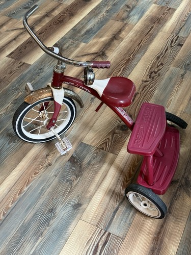 Used red radio flyer tricycle - red,