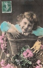 CP CHILD CLEAR EYES IN WICKER BASKET - FLOWERS