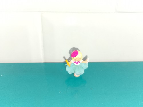 Polly pocket figurine doll