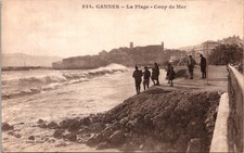 Cannes France La Plage Coup De Mer with People on Walkway Vintage Pos Postcard