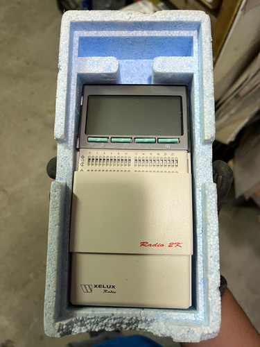 Thermostat programmable radio