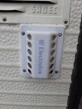 Grille aération frigo