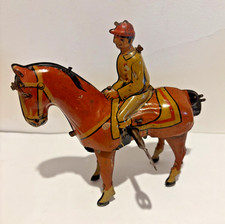 ancien jouet mécanique fer