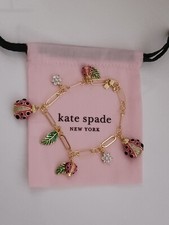 Kate SPADE- New York- Bracelet coccinelles. En plaqué or, émail et strass