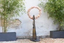 Sculpture en Galets Roses