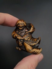 Netsuke - Fujin portant son