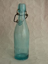 small antique blue glass lemonade bottle