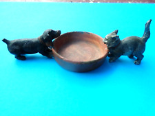 Vienna Bronze?  cat and dog in front of their bowl