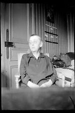 Old lady sitting armchair - Old negative photo year. 1930