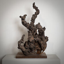 knotty wood erected on a base. carved root of the literate. scholar's rock