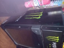 monster energy fridge black with monster logo on the front. Switch in back .