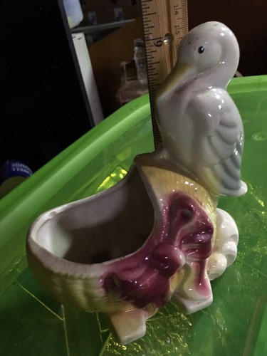 Old stork planter with baby - stork,