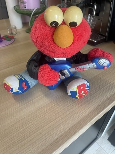 Ancienne peluche elmo rock - ancienne,