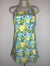 BELLE ROBE COURTE MELROSE A MOTIF FLEURI COULEUR CHAUDE MAINTENU AU COU T:38/40