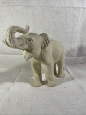 Éléphant en faïence perlée