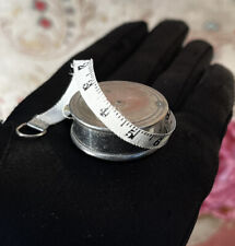ANTIQUE HABERDASHERY, ANTIQUE SMALL METER SEAMSTRESS REEL metal and fabric