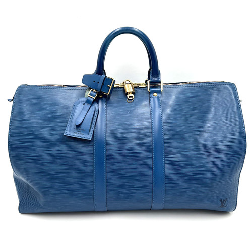 Sac main voyage - de,
