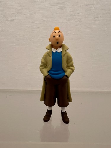 Figurine tintin main dans les