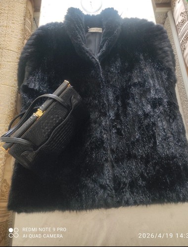 Manteau fausse fourrure