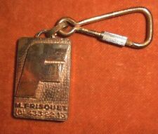 Metal keychain type copper F like not hot so FRISQUET - HYDROMOTRIX