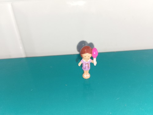 Polly pocket figurine doll