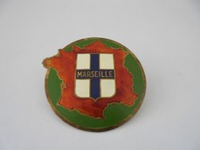 Plaque de calandre émaillée