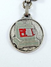 KEYCHAIN - Augis - CASH REGISTERS - CCE - LILLE 1960s - ENAMELLED METAL