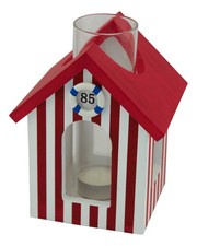 Cabine de plage avec bougies