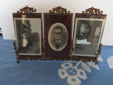 old triple photo frame in brass or bronze and beveled glass