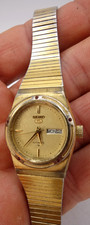 rare montre seiko 5 . doré