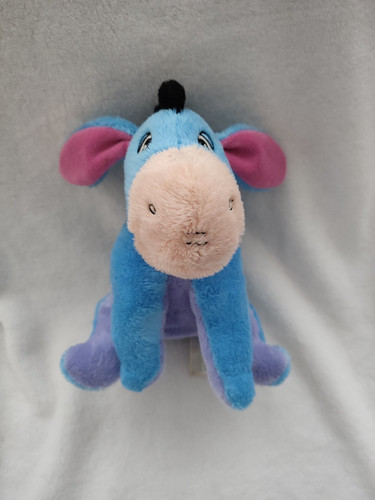 Doudou peluche assis