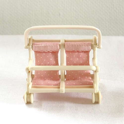 Poussette double miniature