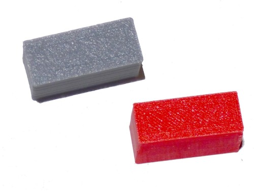 Paire boutons gris rouge - +,