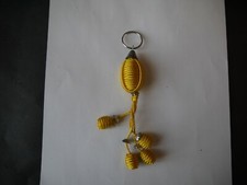 PORTE CLÉ PASSEMENTERIE MAROCAINE GROSSE BOULE AVEC 4 PETITES BOULES JAUNE