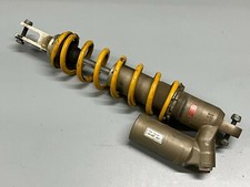 UN AMORTISSEUR ARRIERE MOTO