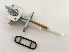 UN ROBINET D ESSENCE NEUF POUR