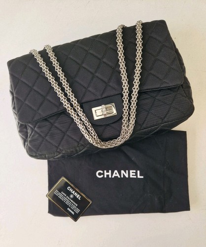 Sac chanel soie noir - 2.55,