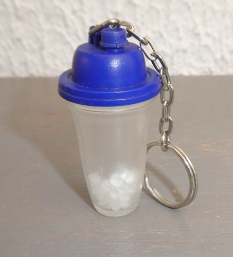 Porte clefs tupperware - porte,