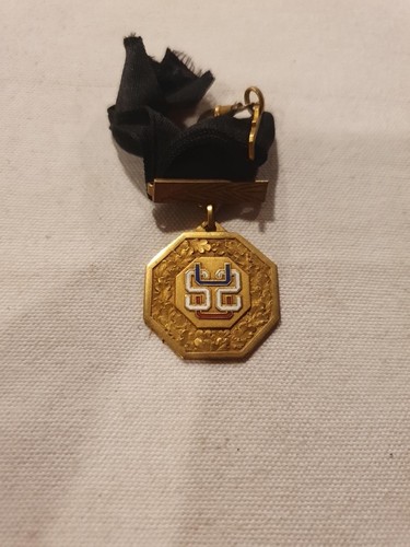 Médaille ancienne octogonale