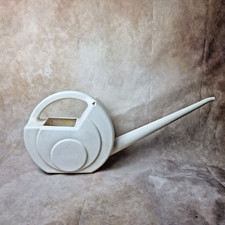 Arrosoir vintage en plastique