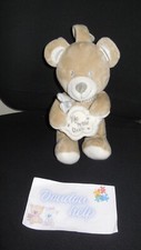 Doudou peluche musical ours