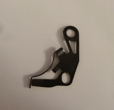 Doigt de retenue (droite) pour