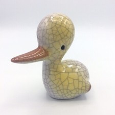 Figurine porte stylo en