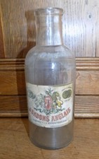 OLD EMPTY GLASS BOTTLE ENGLISH CANDY DISPENSER