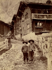 Switzerland, children in front of the chalets, vintage print, ca.1880 Switzerland, children deva